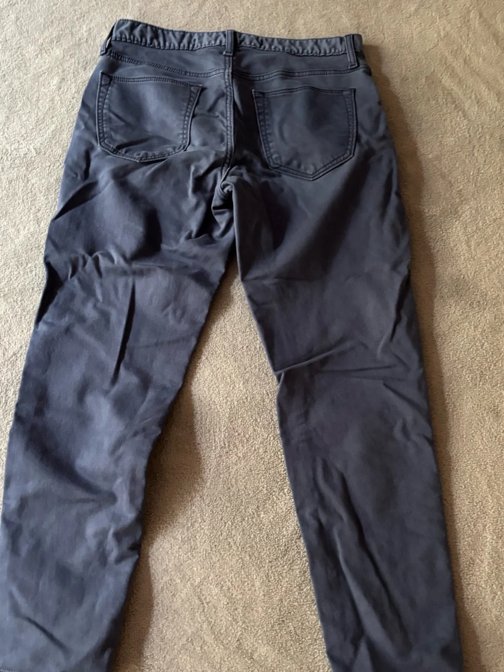 Size 31x32 Banana Republic Athletic fit travel jeans in Brown and Blue.